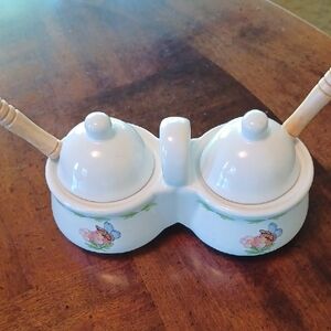 White Ceramic Double Condiment Pot with Floral Accent and Wooden Spoons